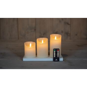 Colección de velas LED recargables con efecto de llama rústico, incluye estación de carga, set de 7.5 cm, color marfil, 3 unidades.